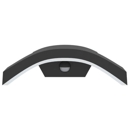 Black and white outdoor wall light fixture on a white background